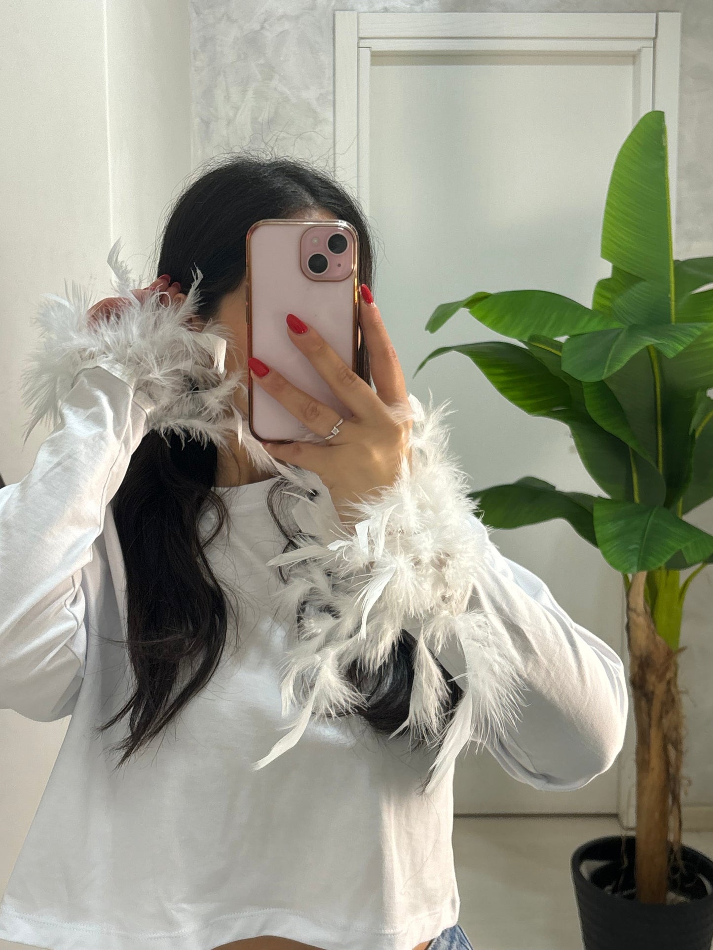 Maglia sartoriale con piume