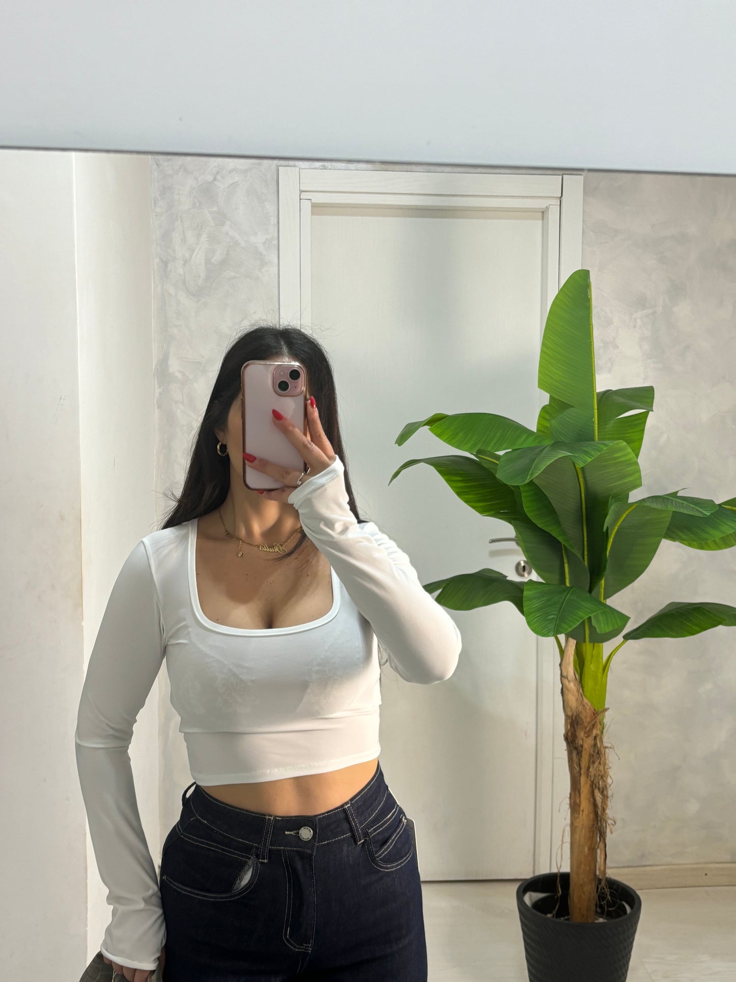 Maglia bianca manica a guanto